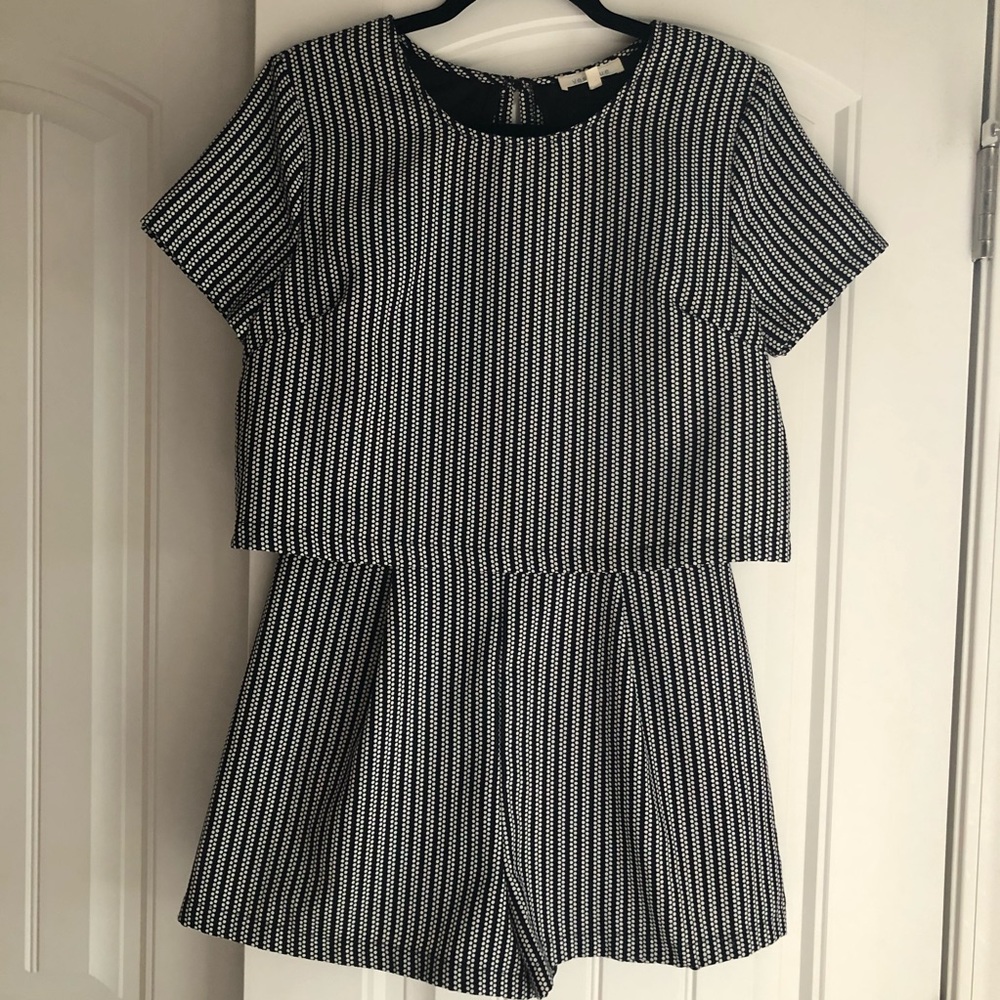 Vestique Black & White Open-Back Romper